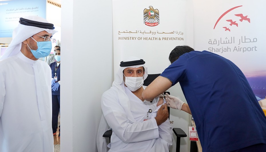 Sharjah Airport staff receive first dose of Covid-19 vaccine