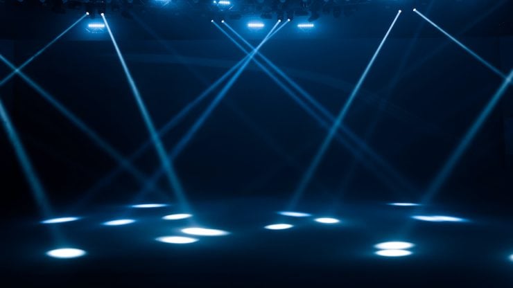 Concert lighting on black stage conference