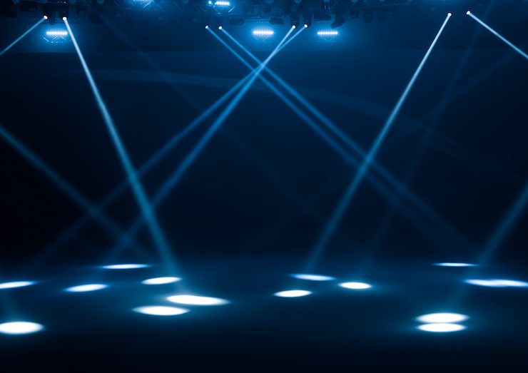 Concert lighting on black stage conference