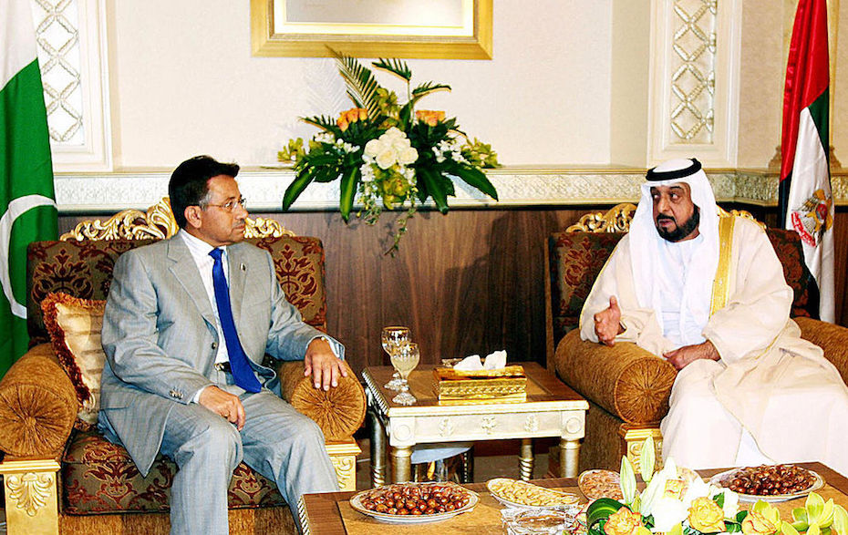 Sheikh Khalifa Bin Zayed al-Nahyan (R) welcomes Pakistani President Pervez Musharraf upon his arrival to Abu Dhabi June 04, 2005. (Photo credit should read WAM/AFP via Getty Images)