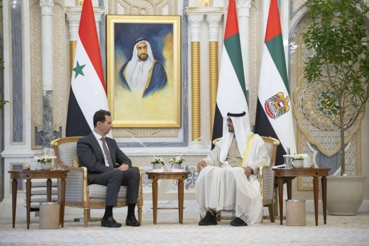 President Mohamed talks to President Assad