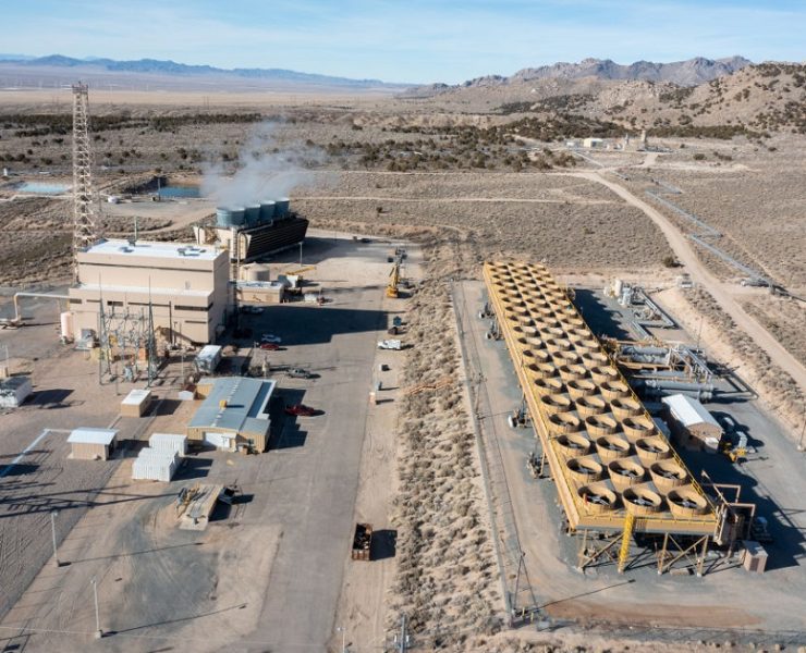 Heat exchangers for the binary geothermal system at the Blundell Geothermal Plant in Utah. At left are the cooling towers of the single-flash unit at the plant and the main generating building. (photo by: Jon G. Fuller/VW Pics/ Universal Images Group via Getty Images)