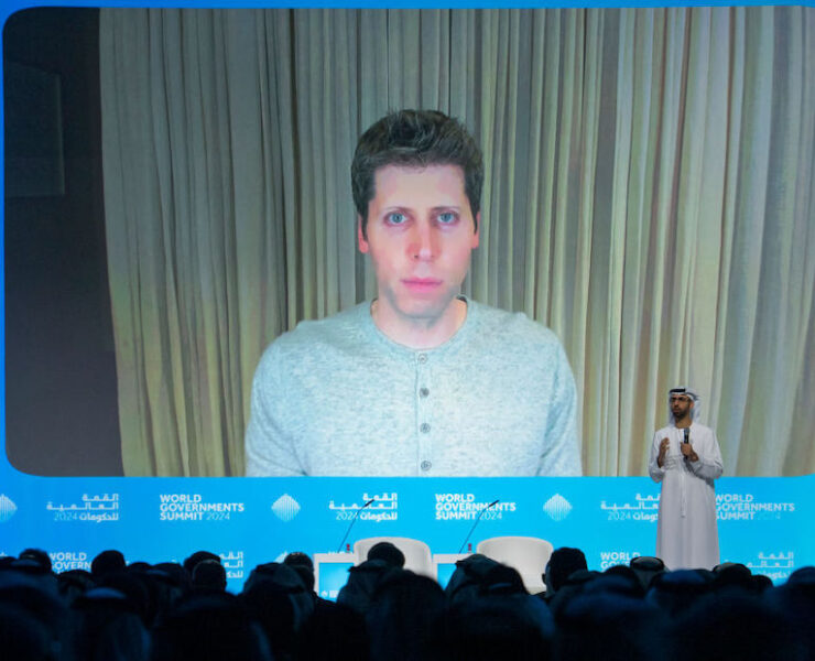 Sam Altman, OpenAI CEO (on screen) speaks in a videocall with Omar al-Olama, Minister of State for Artificial Intelligence, Digital Economy and Remote Work Applications, during the World Government Summit in Dubai on February 13, 2024. (Photo by Ryan LIM / AFP)