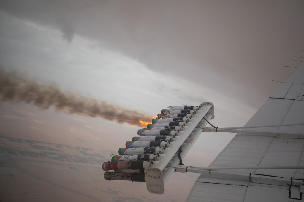 Cloud seeding in the UAE AL AIN, UNITED ARAB EMIRATES - JANUARY 31: Ground engineers restocking one of the UAE's National Center of Meteorology cloud-seeding planes with new Hygroscopic salt flares on January 31, 2024 in Al Ain, United Arab Emirates. Cloud seeding is a weather modification technique that employs chemicals to stimulate the formation of ice crystals or raindrops within clouds. Although cloud seeding has been in use since 1947, its significance has grown, particularly for arid regions like the UAE. The country, with its own National Center of Meteorology and Seismology deploying planes for cloud seeding, has invested in the technology as an immediate solution to address challenges related to water scarcity. (Photo by Andrea DiCenzo/Getty Images)
