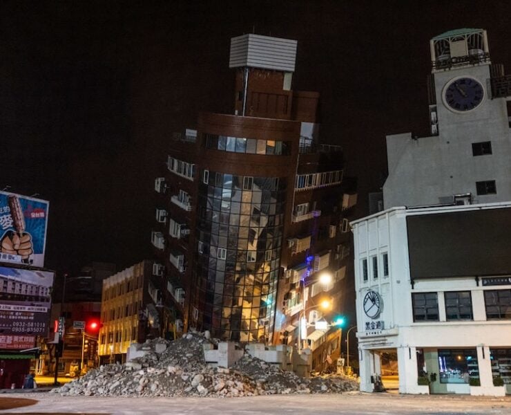 HUALIEN, TAIWAN - APRIL 04: An area of a damaged building is cordoned off following the earthquake on April 04, 2024 in Hualien, Taiwan. A 7.5 magnitude earthquake hit eastern Taiwan on Wednesday, triggering a tsunami warning for the coastline in Taiwan, the Philippines and Japan. (Photo by Annabelle Chih/Getty Images)