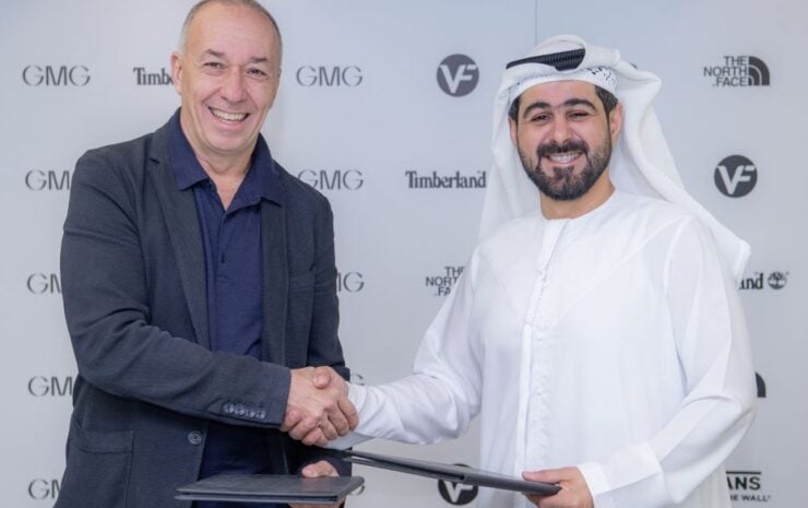 VF Corporation's Martino Scabbia Guerrini and GMG CEO Mohammad A. Baker sign partnership agreement