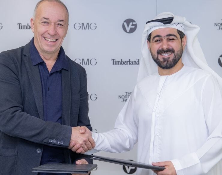 VF Corporation's Martino Scabbia Guerrini and GMG CEO Mohammad A. Baker sign partnership agreement