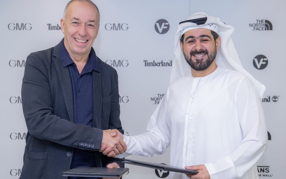 VF Corporation's Martino Scabbia Guerrini and GMG CEO Mohammad A. Baker sign partnership agreement
