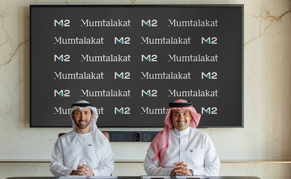 Mumtalakat's Shaikh Abdulla bin Khalifa Al Khalifa and Hasan Jasem Al Nowais of M42
