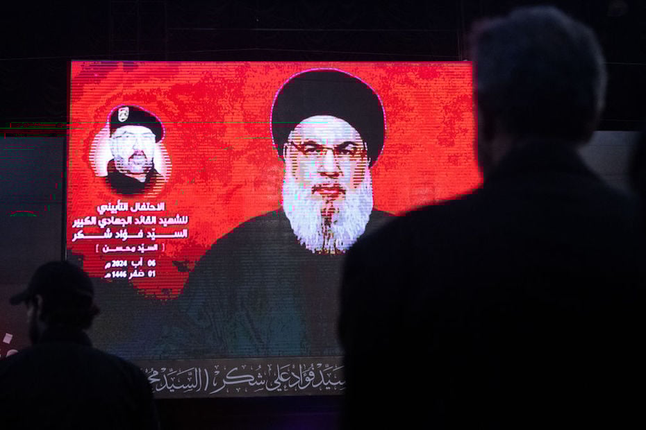 BEIRUT, LEBANON - AUGUST 06: Supporters listen to Hezbollah leader Sayyed Hassan Nasrallah via a video link during a ceremony to mark the first week since the killing of Hezbollah's top commander Fuad Shukr on August 06, 2024 in Beirut, Lebanon. (Photo by Chris McGrath/Getty Images)