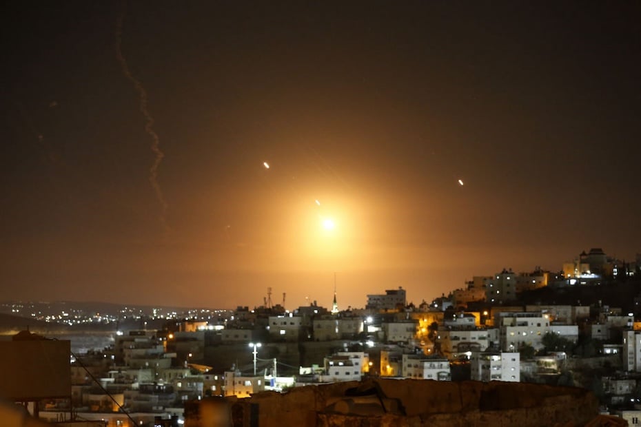 Many rockets, fired from Iran, are seen over Jerusalem from Hebron, West Bank on October 01, 2024. The Israeli army announced that missiles were fired from Iran towards Israel and sirens were heard across the country, especially in Tel Aviv. (Photo by Wisam Hashlamoun/Anadolu via Getty Images)